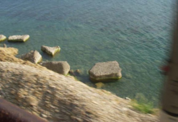 Fig. 6 : The coastal site with a landslide and downfall phenomena