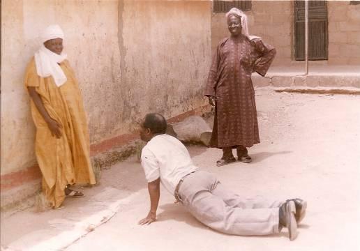 sexual exploitations or involuntary labour"3 . Finally, for Carling, "trafficking in person is restricted to instances where people are deceived, threatened or coerced into situations of exploitation including prostitution"4 .Picture three is the researcher, paying homage to female king of Unwana, Eze Ogo II, in the Afigbo North Local Government of Eboyin state.