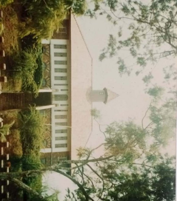 Fig. 7: Bafut Men and a whiteman performing Honours to Fon