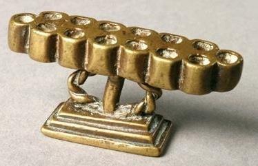 Figure 7: Akan gold-weight, "Oware"