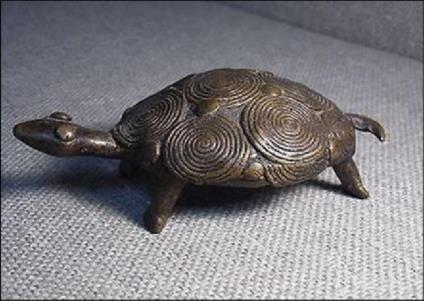 Figure 12: Akan gold-weights exhibited to depict farm tools of Akans (their way of life), 2016. Institute of African Studies, University of Ghana, Legon. Image by the researcher