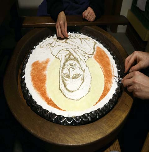 Figure 1: Painted coliva (in Bulgaria) Source: Coliva: defini?ie ?i minunea Sfântului Teodor Tironfotoreportaj de la decorareacolivei, n.d. a) Coliva in the Republic of MoldovaFood has always been a significant identity landmark both at the individual level and at the group or national level. Many of the traditional dishes are perpetuated from one generation to another, such as: ritual bread, coliva, dumplings, cake, pies, wine, etc. (National cultural heritage as a resource for a